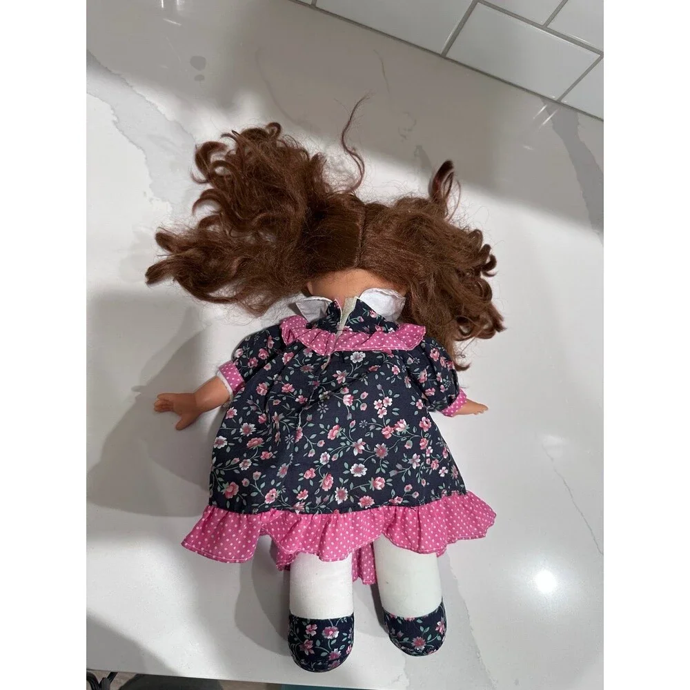 Vintage Brunette Girl Doll Floral Dress Brown Eyes Soft Body Collectible Toy